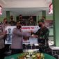 Polres Tanggamus Berikan Surprise dan Tumpeng ke Kodim 0434. Ist