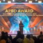 Menteri Dalam Negeri Tito Karnavian saat sambutan Acara Penganugerahan APBD Award dan Rakornas Keuangan Daerah 2024 di Jakarta, Rabu (18/12/2024)